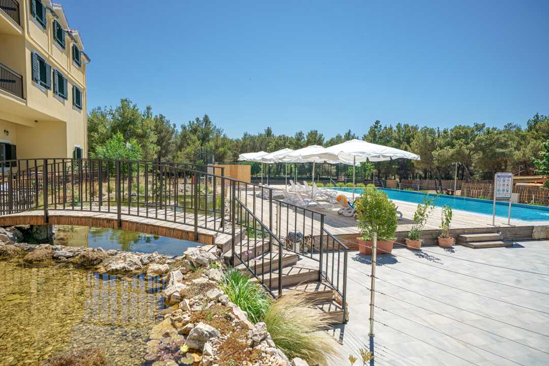 Outdoor pool surrounded by nature